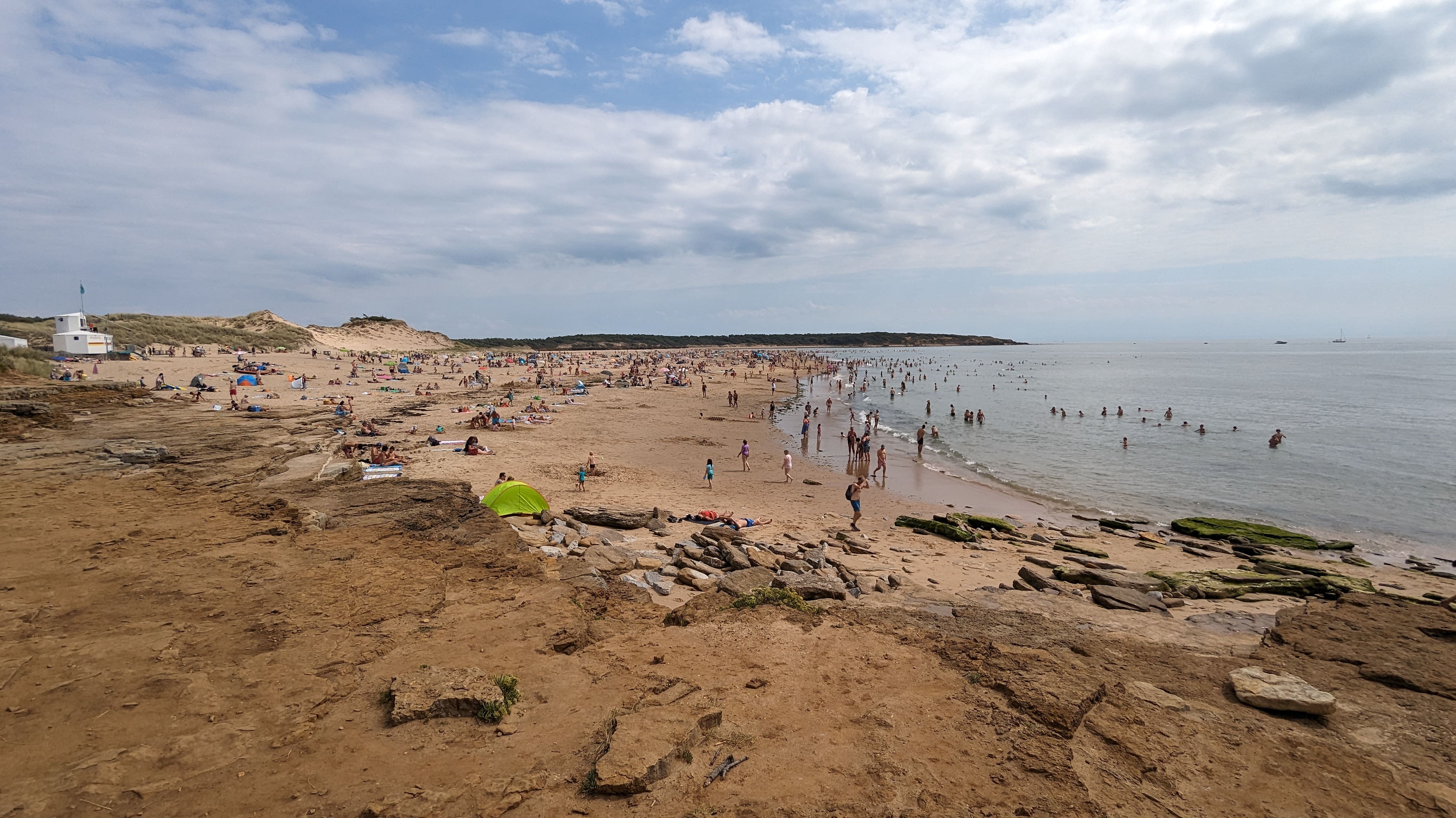 Le sable, les gens & les vagues