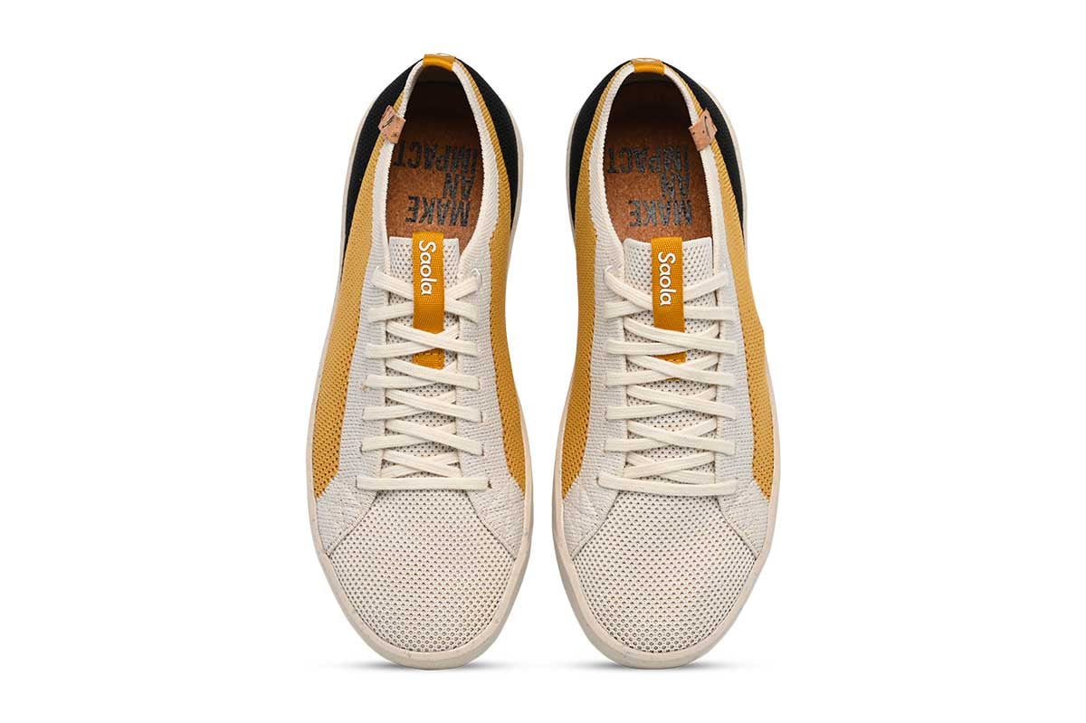 Cannon Knit W 2.0 White / Gold, modèle femme Saola © DR