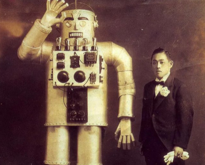 Yasutaro Mitsui with his steel humanoid robot, Tokyo, 1932