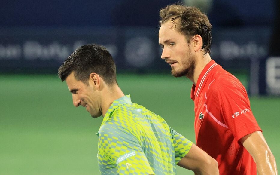 "Le mec je le bats et il rigole quand même" Daniil Medvedev et Novak Djokovic © Karim SAHIB/AFP